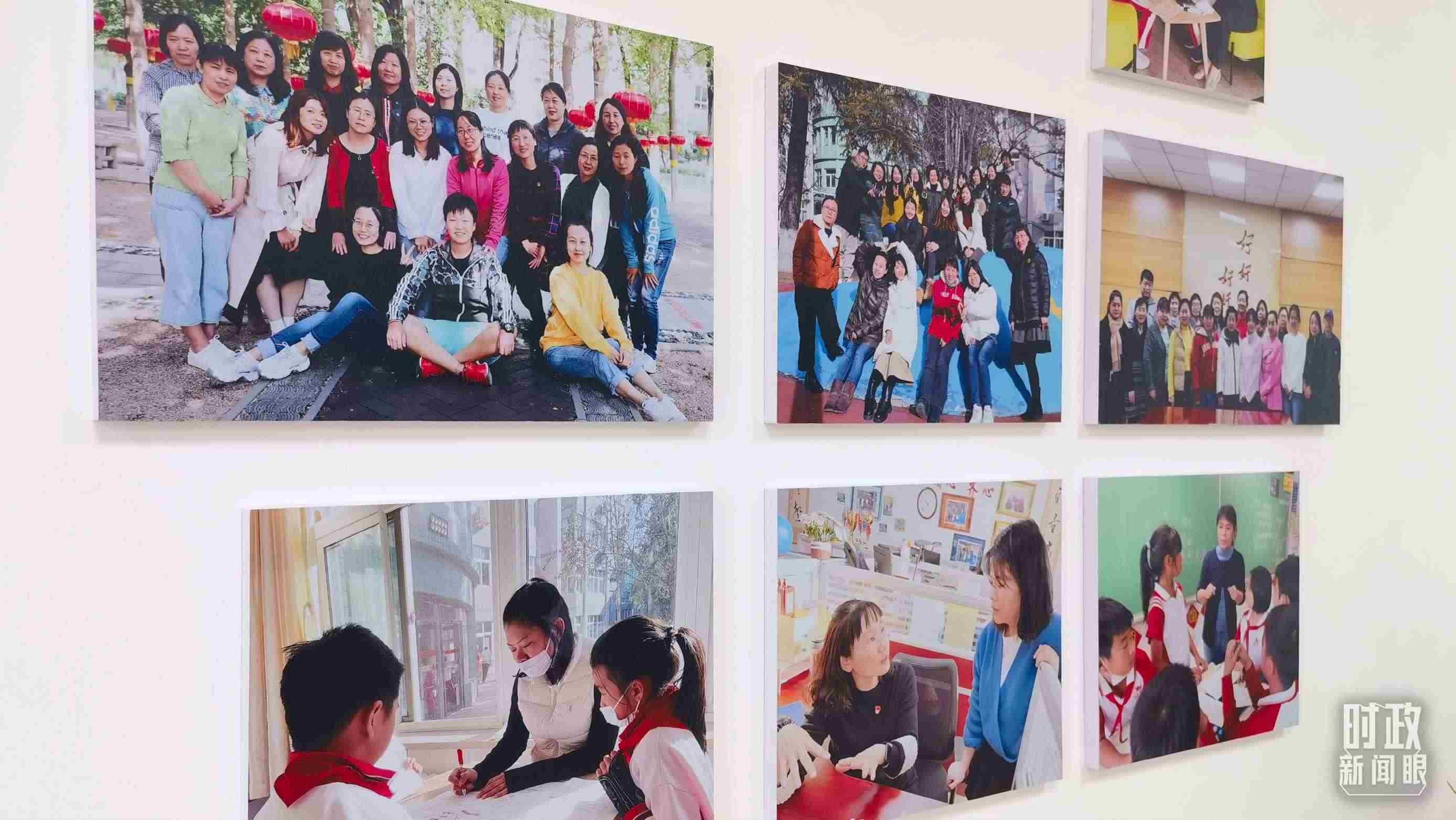 △五年級教師辦公室內(nèi)的合影展板。（總臺央視記者賈林拍攝）