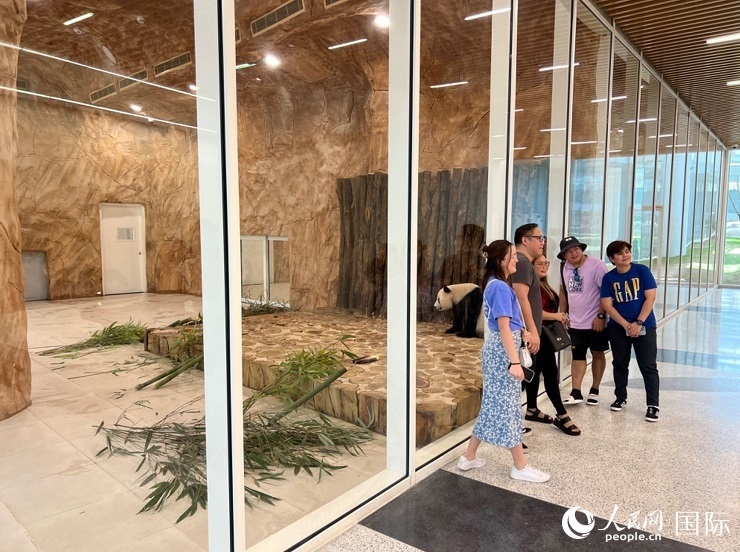 當(dāng)?shù)赜慰团c“四?！焙嫌?。人民網(wǎng)記者 張志文攝