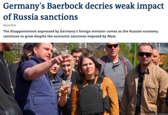 △“德國(guó)之聲”網(wǎng)站報(bào)道截圖（題圖中間為貝爾伯克）