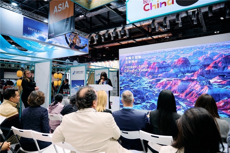  “中國館”新疆旅游推介會現(xiàn)場介紹。楊浩鵬攝